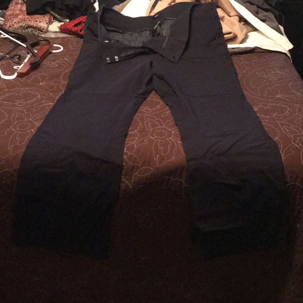 Worn once. Dark navy blue stretch slacks.